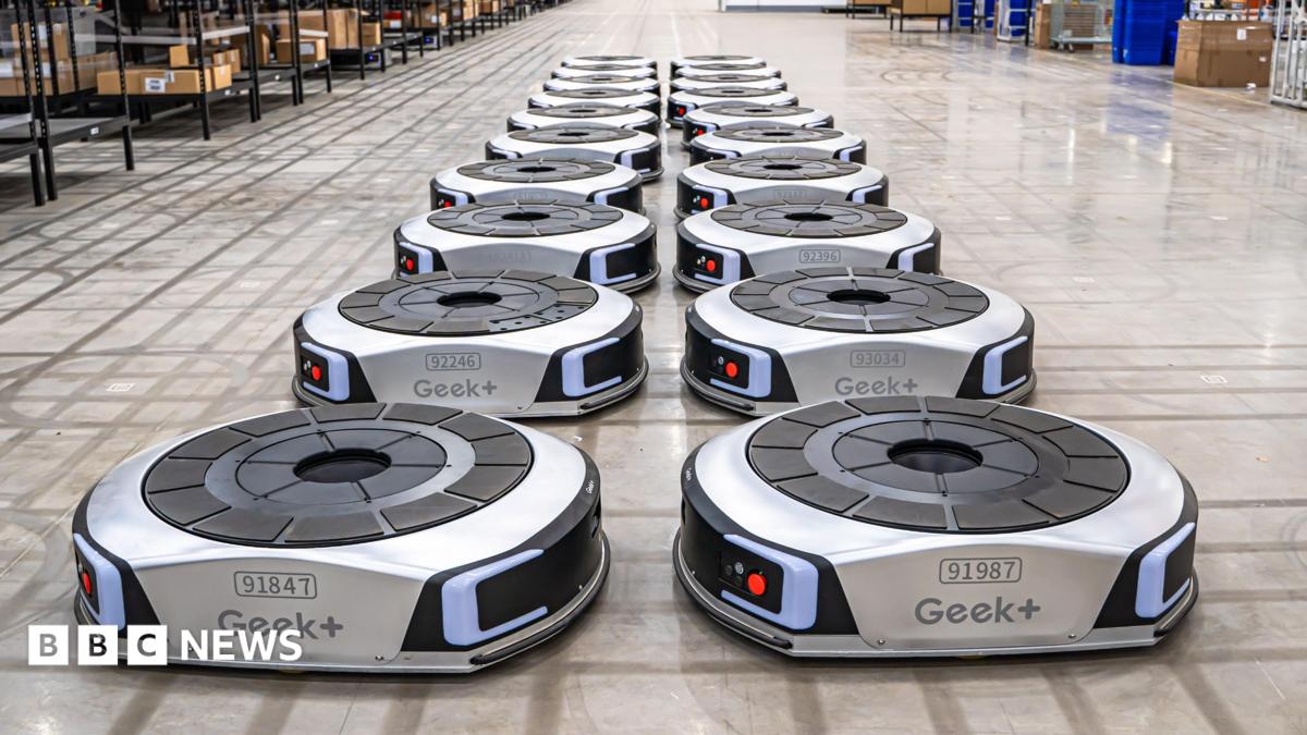 Geek+ floor robots lines up in a UK warehouse