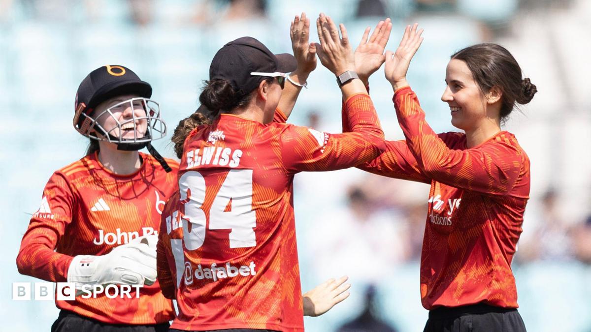 Charli Knott (right) is congratulated by Blaze team-mate Georgia Elwiss (wearing the number 34) after taking a wicket against Surrey in the Vitality Women's Blast semi-final at The Oval on Friday 17 July, 2026