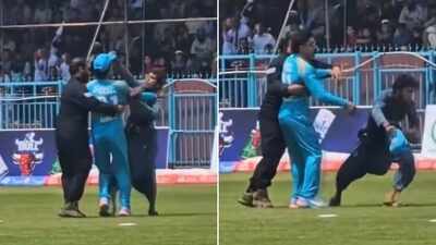 Fan on a mission: Pitch invader steals Rahmanullah Gurbaz's cap mid-match and runs away - Watch