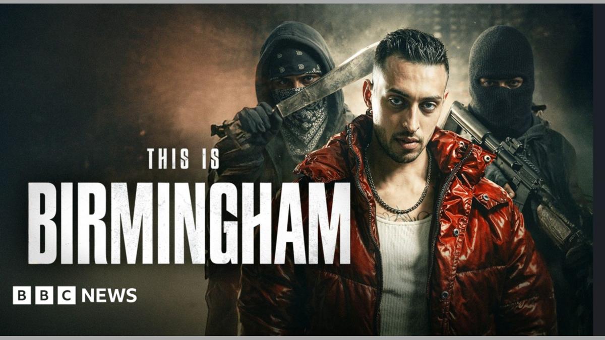 A promotional poster for a film, with an actor in the foreground in a shiny red jacket and white vest, with slicked back dark hair. Behind him are two men in balaclavas, and black clothing, holding a knife and a gun. This is Birmingham is written in white text.