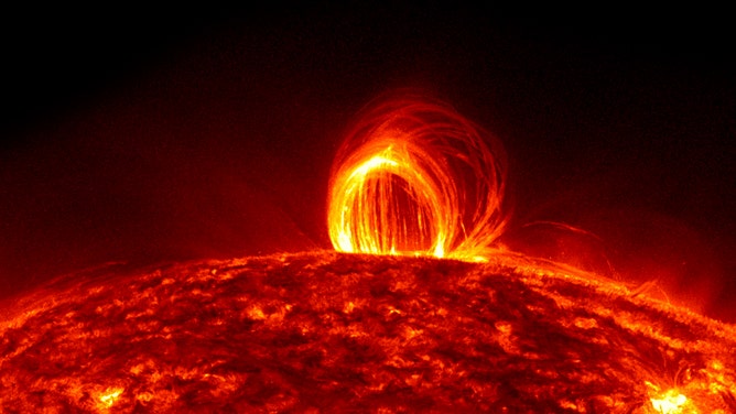 NASA File photo: On July 19, 2012, million-degree plasma in the sun's atmosphere began to cool and fall to the surface, resulting in a dazzling magnetic display known as coronal rain.