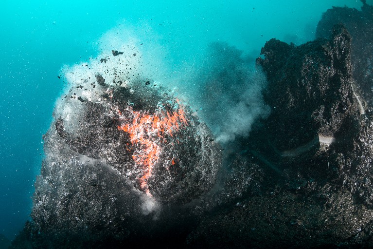 Pillow lava forming from an undersea fissure in Hawaii.