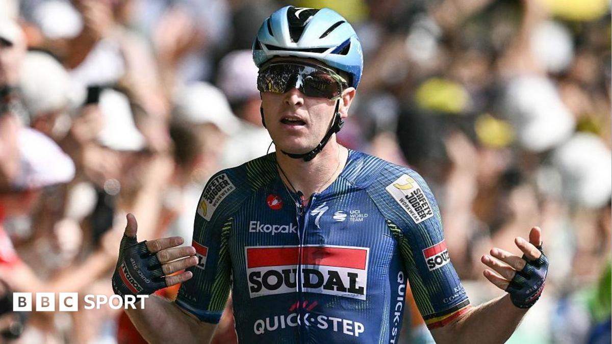 Tim Merlier celebrates winning stage seven