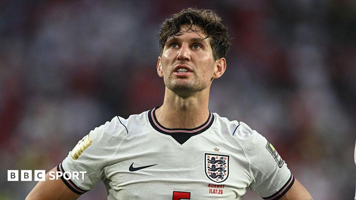 John Stones wearing an England shirt