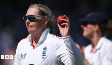 England captain Heather Knight smiles in the England team huddle before the start of play on day three against India at Lord's