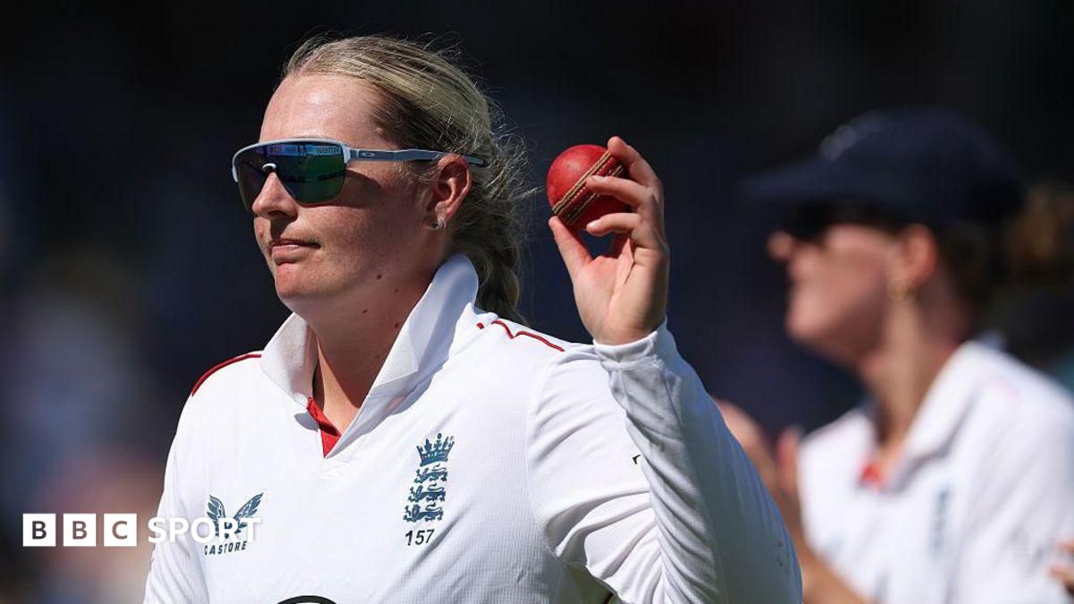 England captain Heather Knight smiles in the England team huddle before the start of play on day three against India at Lord's