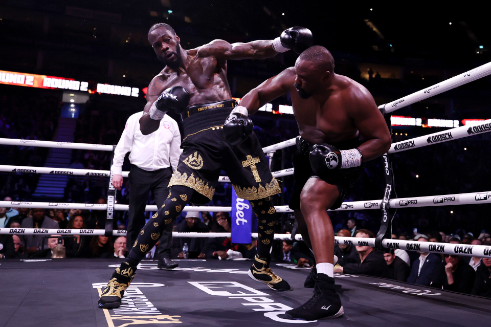 Derek Chisora punches Deontay Wilder during the Heavyweight fight between Derek Chisora and Deontay Wilder as part of the Dereck Chisora v Deontay Wilder: 100 fight night at The O2 Arena on April 04, 2026 in London, England