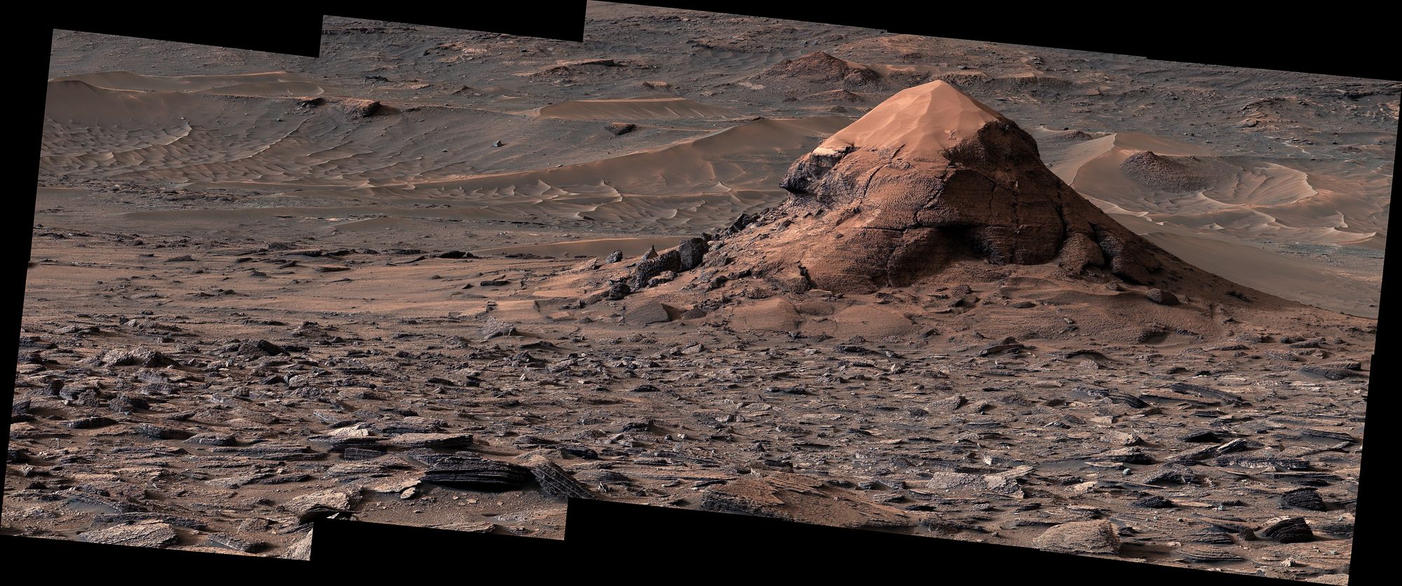 The polygons surround this 20-foot-tall Martian butte known as ‘Miraflores’
