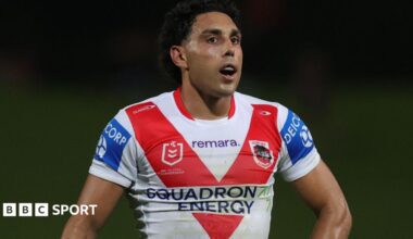 Tyrell Sloan in action for St George Illawarra in the club's white home shirt with red V on the chest