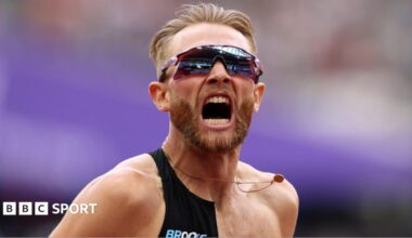 Great Britain's Josh Kerr celebrates after breaking the men's mile world record