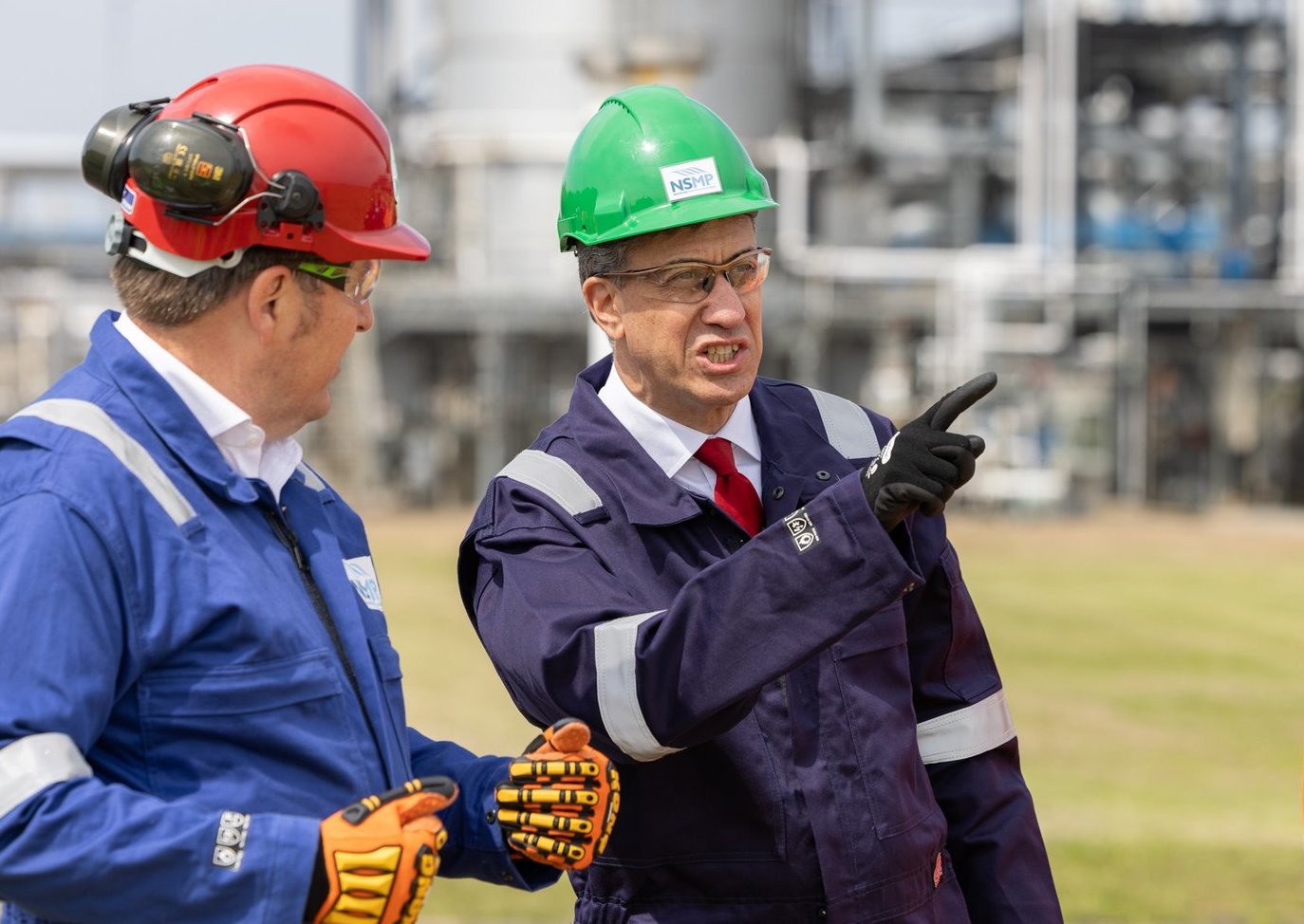 Ed Miliband wearing a hard hat