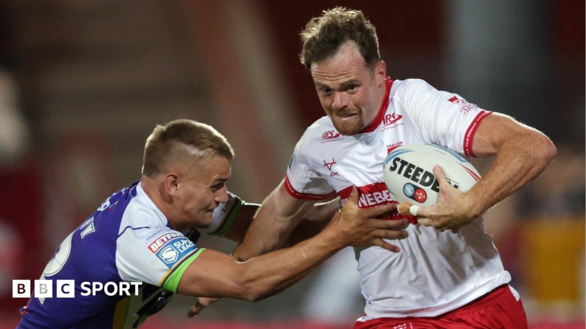 Joe Burgess carries the ball wearing a white and red Hull KR kit