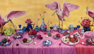 a still life painting crashed by spoonbill birds. much of the piece is tinged pink with blue and red elements on the table and a gold wall