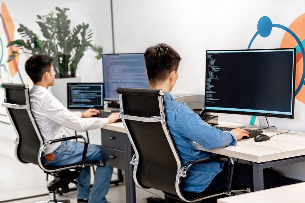 Employees working on desktop computers