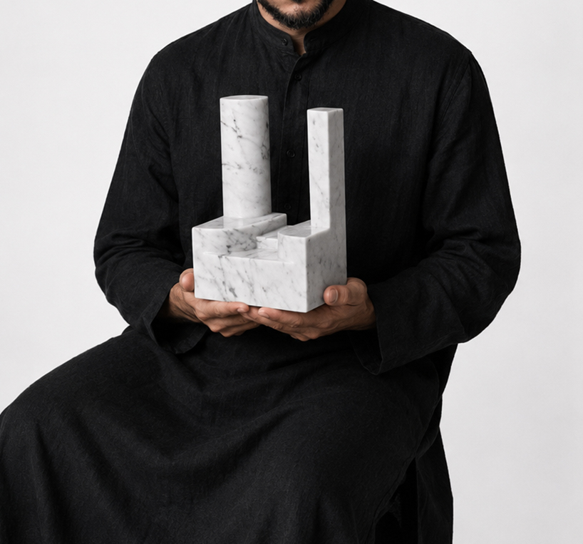 carved from solid carrara marble, abstract house-like objects explore architectural form - 3