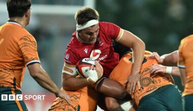 Wales Under-20s captain Deian Gwynne carries the ball into the Australia defence