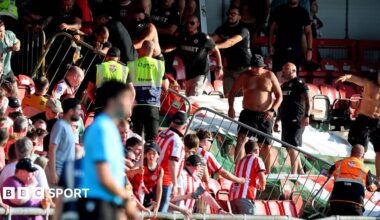 CSKA Sofia fans rush a barrier at the Brandywell