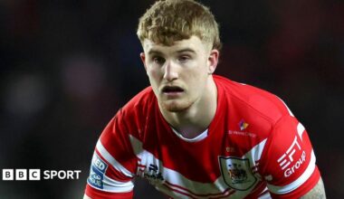 George Delaney in action for St Helens in their red and white home shirt