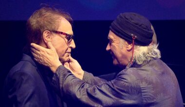 Ray and Dave Davies embrace onstage at the Q Awards in 2018