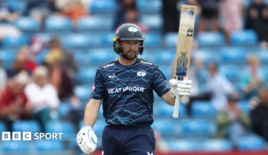 Yorkshire opener Adam Lyth raises his bat after reaching a T20 half-century