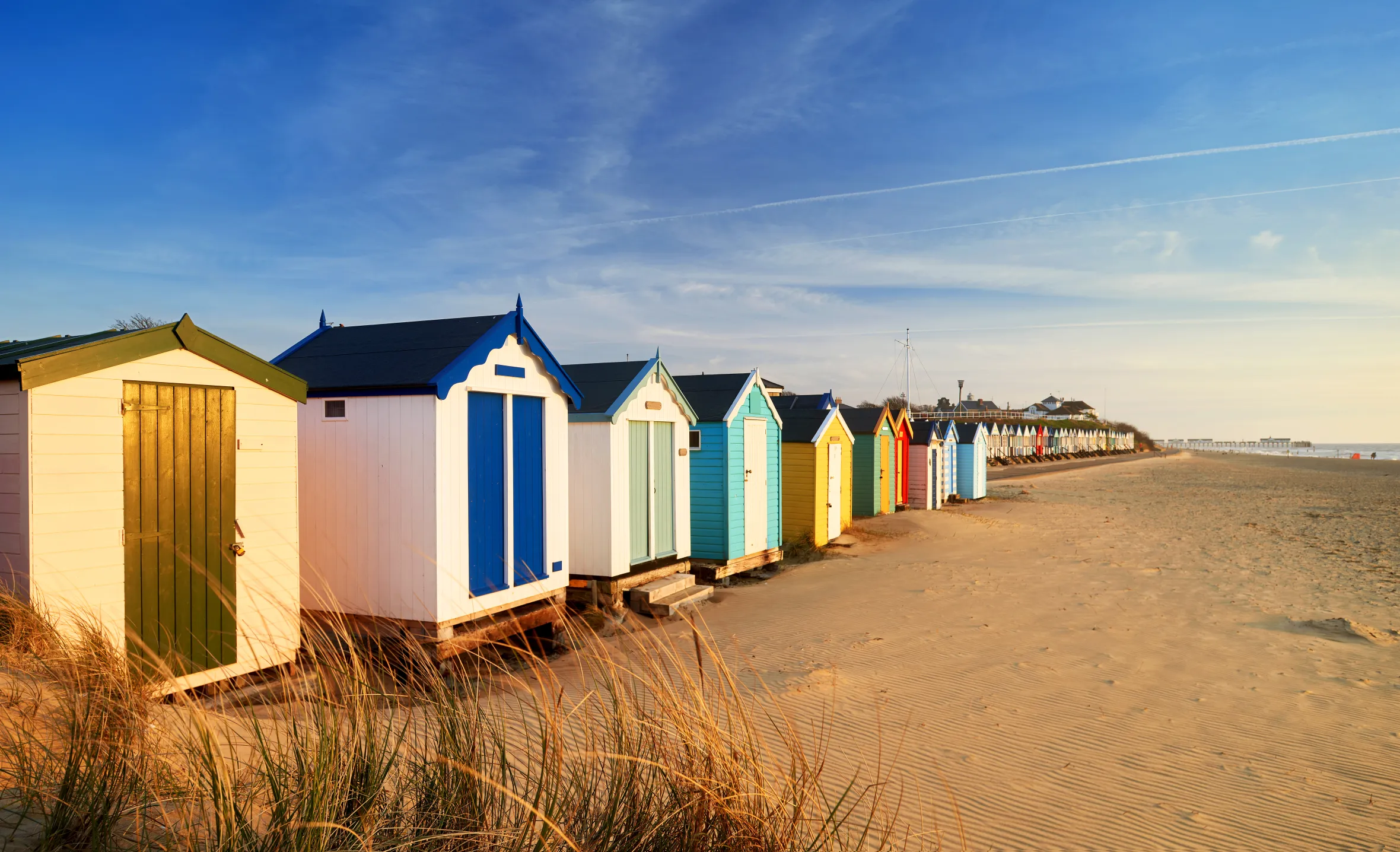 Beach huts on the sandy coast of Southwold, Suffolk, United Kingdom