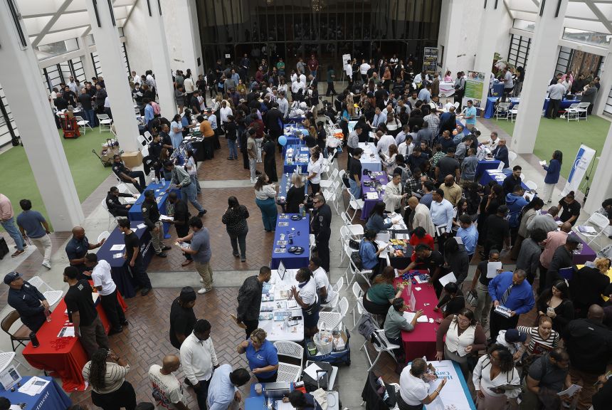 Job seekers meet with recruiters during the HIRE360 Diversity Hiring Expo & Mega Career Expo at the Carson Event Center on June 30, 2026, in Carson, California.