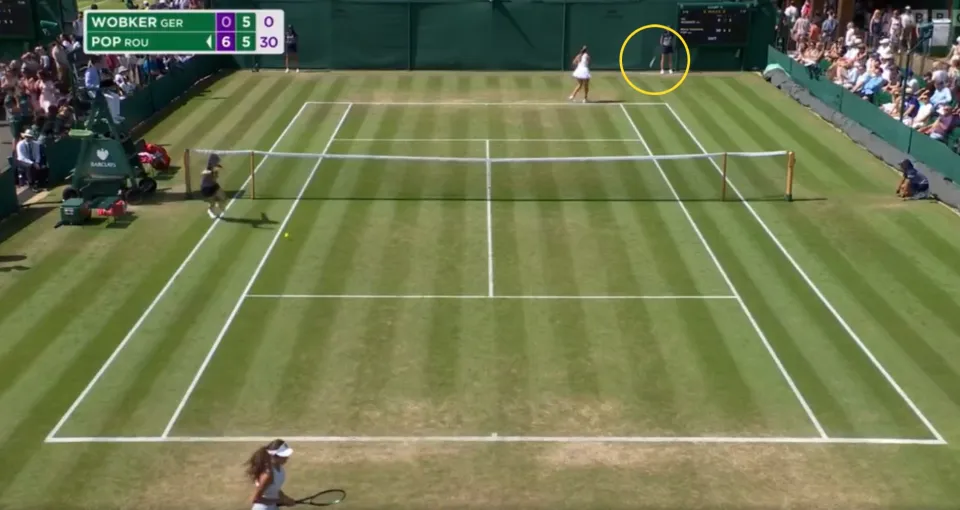 Ida Wobker throws her racquet during a match at Wimbledon