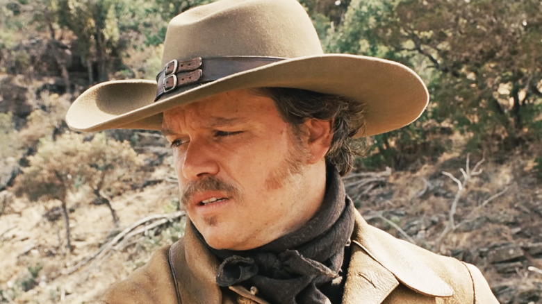 Matt Damon's Texas Ranger LaBoeuf looks off to his right in closeup in True Grit