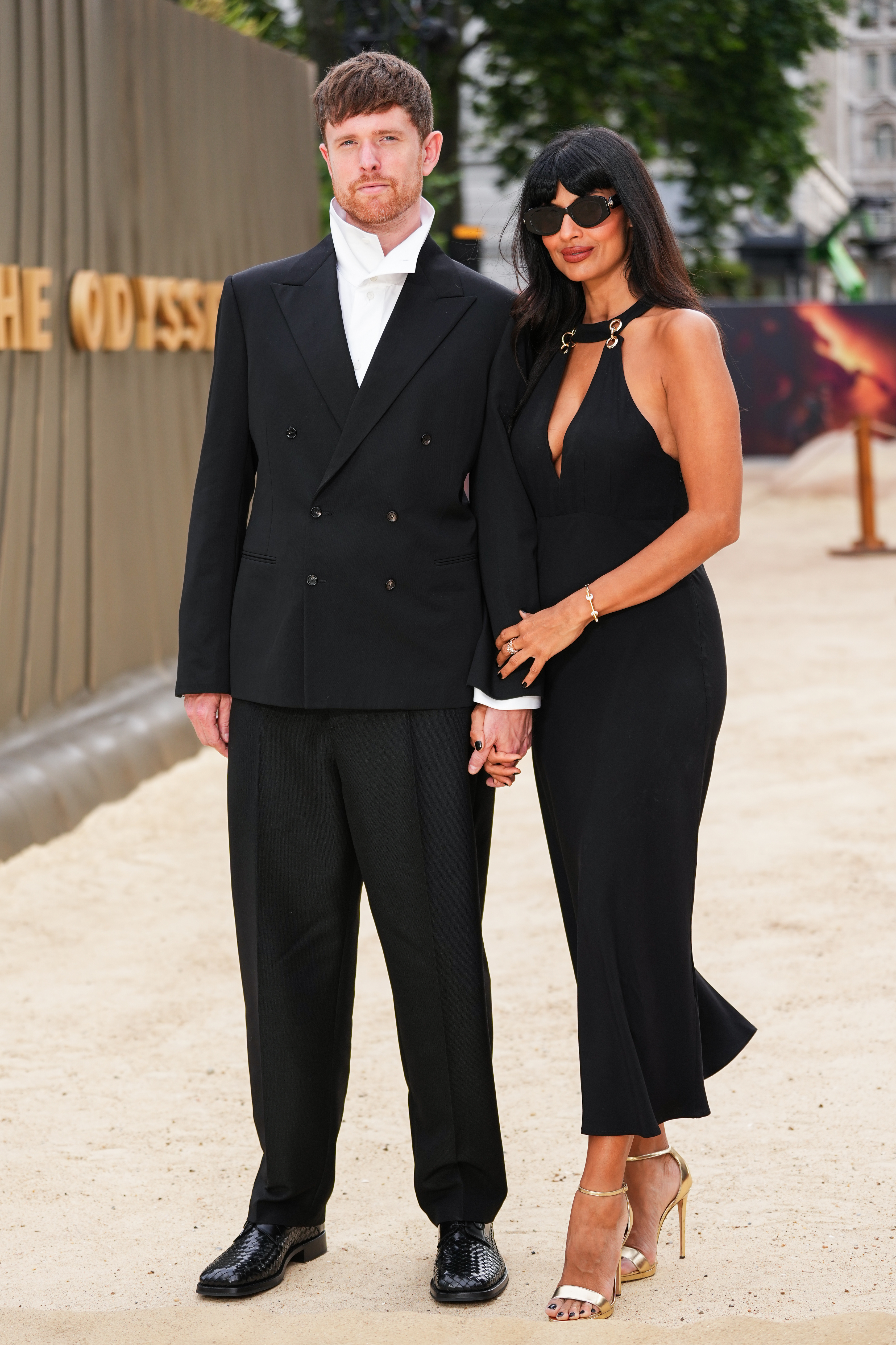 James Blake, left, and Jameela Jamil pose for photographers upon arrival at the premiere of the film 'The Odyssey'