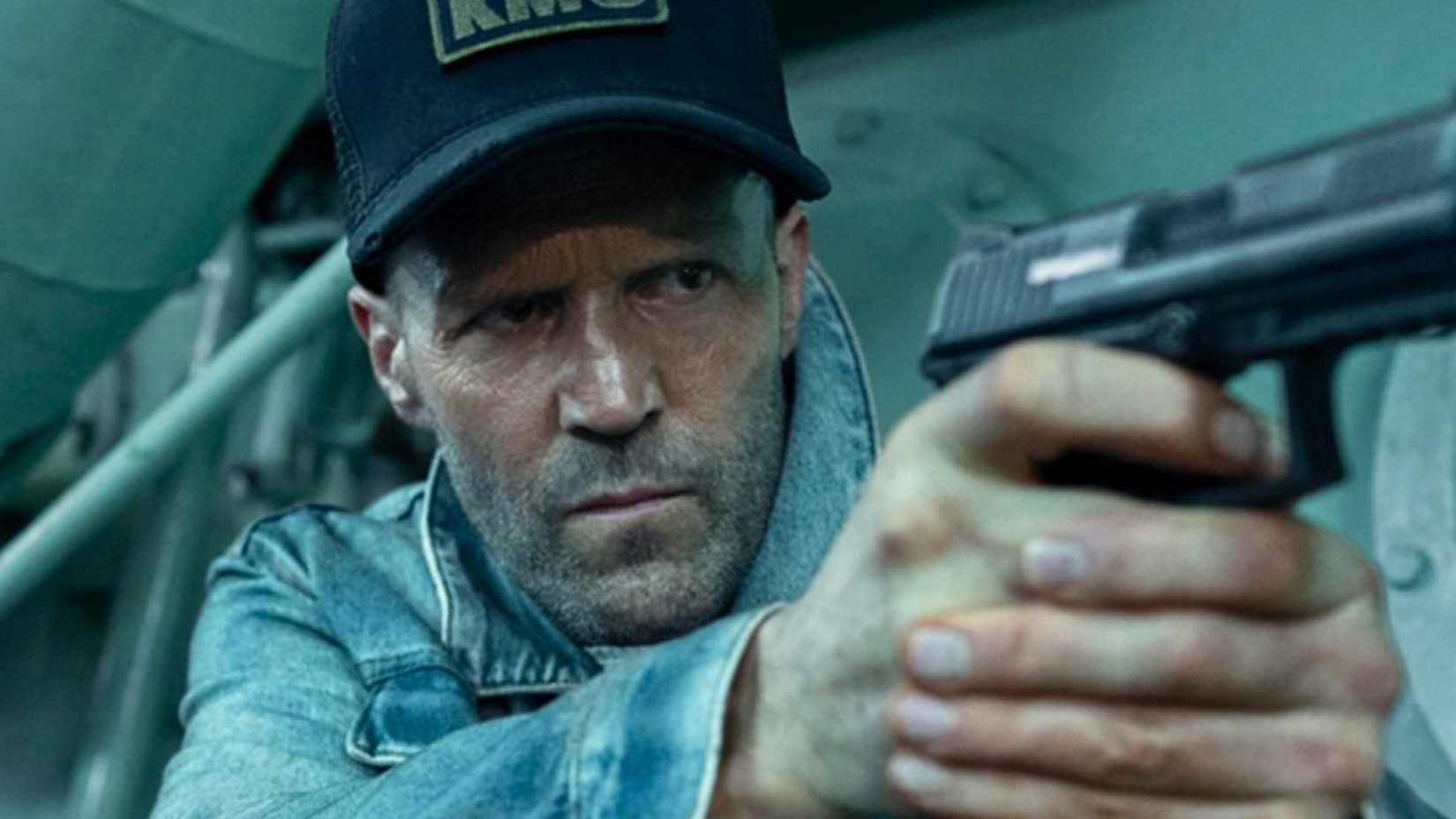 Jason Statham holding gun in Mutiny