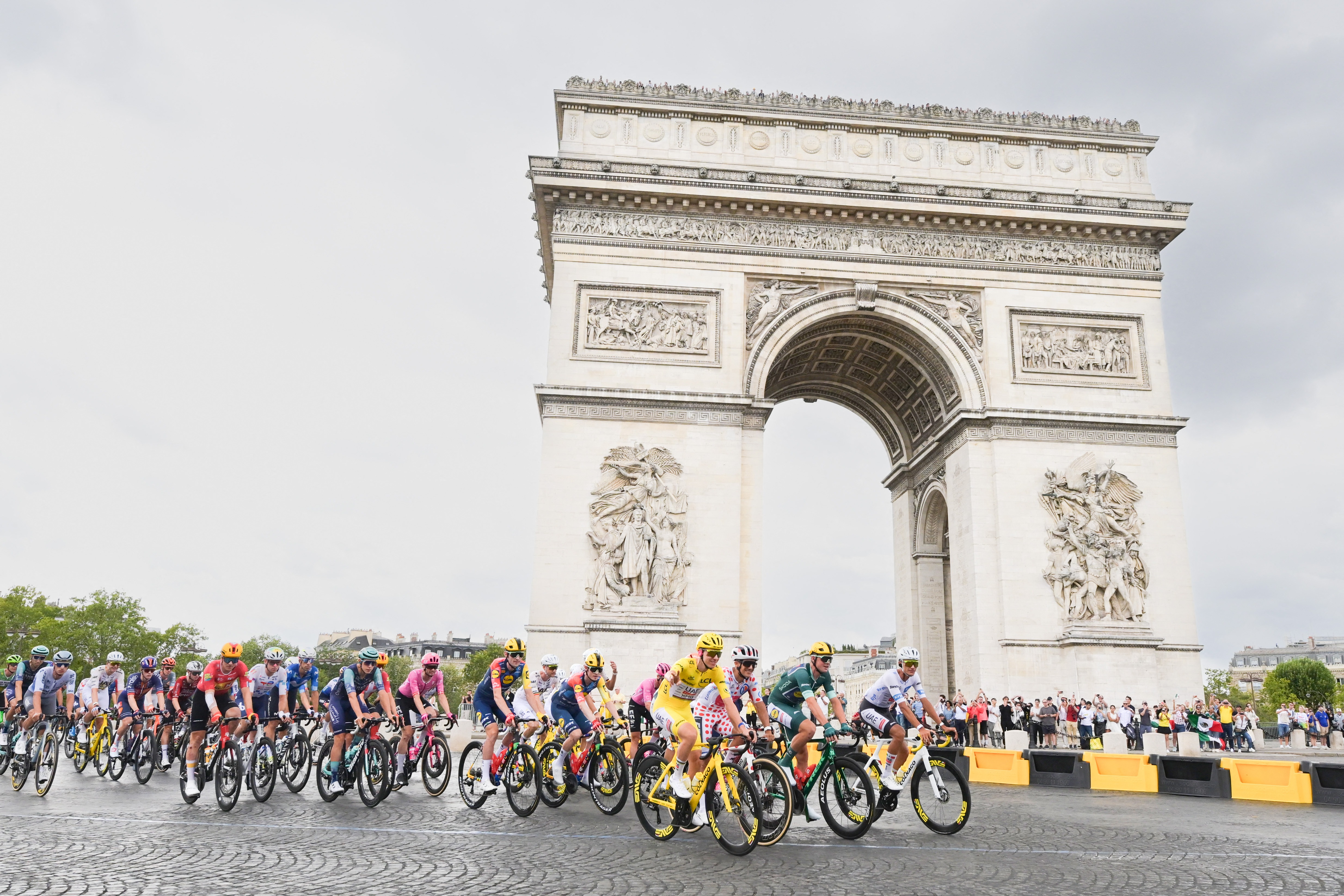 Slovenian Tadej Pogacar of UAE Team Emirates XRG, Ecuadorian Richard Carapaz of EF Education-EasyPost, Danish Mads Pedersen of Lidl-Trek and Mexican Isaac Del Toro of UAE Team Emirates XRG pictured in action during stage 21 of the 2026 Tour de France cycling race, a stage of 130km from Thoiry to Paris Champs-Elysees , on Sunday 26 July 2026. The 113th edition of the Tour de France starts on Saturday 4 July in Barcelona, Spain, and will finish in Paris, France on the 26th of July. BELGA PHOTO DAVID PINTENS (Photo by DAVID PINTENS / BELGA MAG / Belga via AFP)