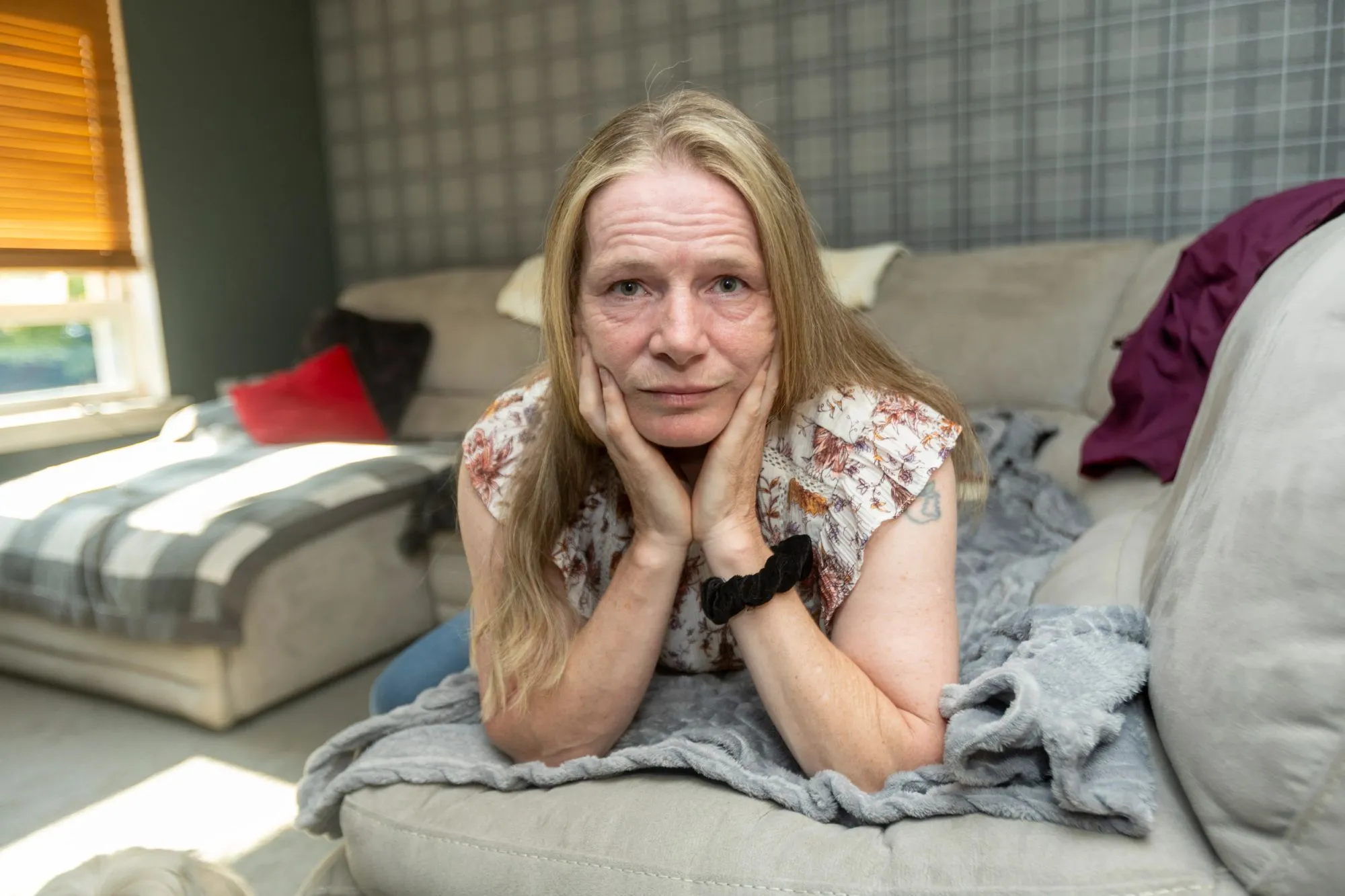 An image collage containing 1 images, Image 1 shows Andrea Anderson in her home in Broxburn