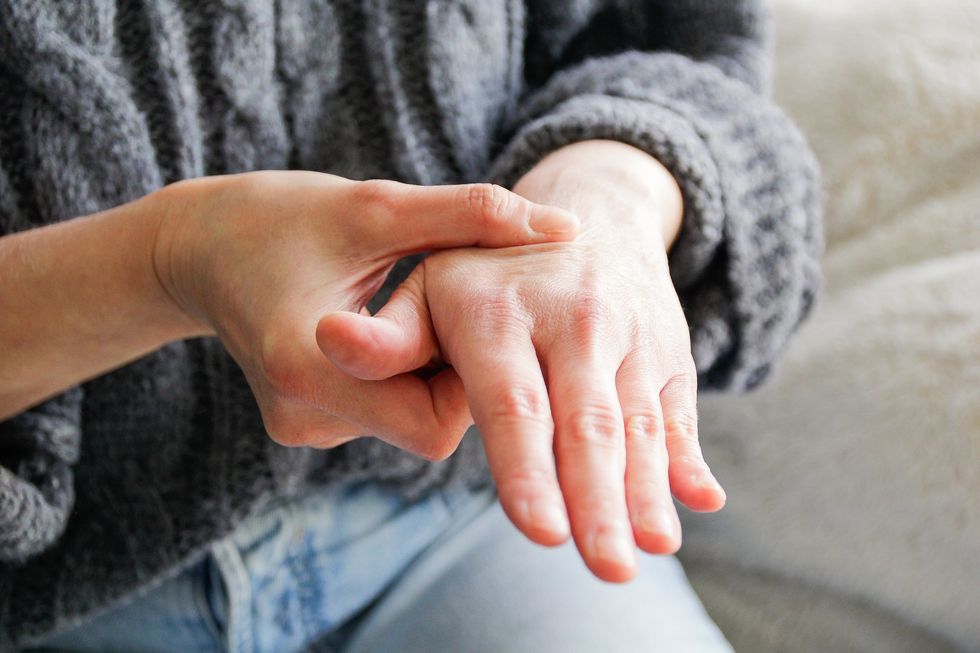 pins and needles in hand