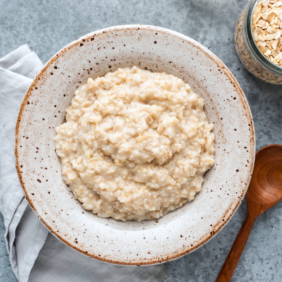 Plain oatmeal porridge in bowl plain oatmeal porridge in bowl