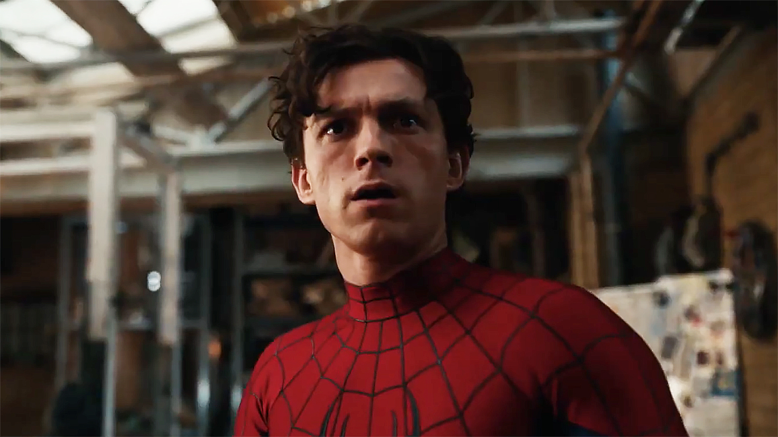 Tom Holland's Peter Parker looking confused while wearing his superhero suit in Spider-Man: Brand New Day