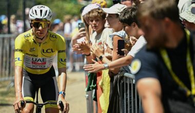 Tadej Pogacar wearing the overall leader's yellow jersey awaits the start of the 19th stage of the 113th edition of the Tour de France