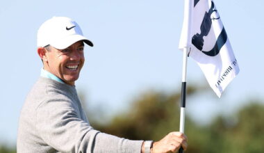 Rory McIlroy holds a flag during his practice round at Royal Birkdale