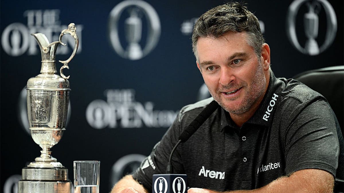 Ryan Fox of New Zealand with the Claret Jug