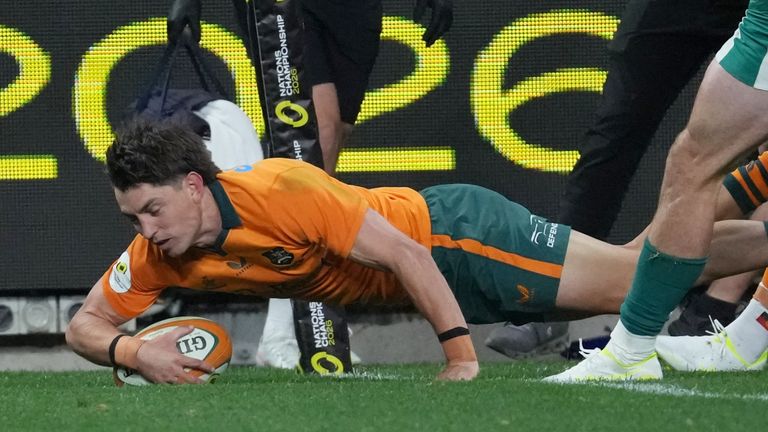 Jock Campbell scores Australia's second try against Ireland in the Nations Championship