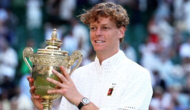 Jannik Sinner of Italy poses for a photo with The Gentlemen's Singles Trophy after victory against Alexander Zverev of Germany in the Gentle