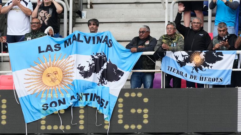 Argentina's fans hold a banner reading in Spanish "The Malvinas are Argentine", referring to the Falkland Islands prior to a Nations Championship rugby match between Argentina and England in Santiago Del Estero, Argentina, Saturday, July 18, 2026. (AP Photo/Gustavo Garello)