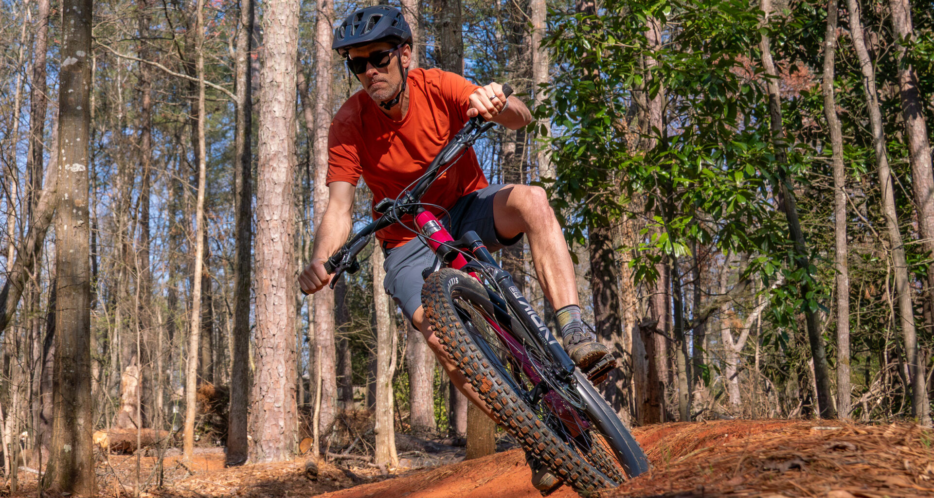 The trails got smoother and the bikes got burlier. Something has to give.