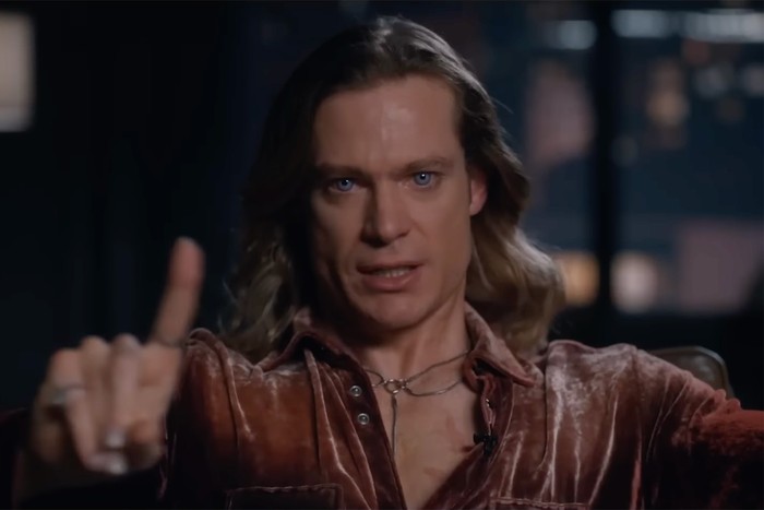 vampire-lestat Sam Reid as Lestat in The Vampire Lestat. He is shaking one finger in the air as if to dismiss or refuse something, with a serious expression on his face