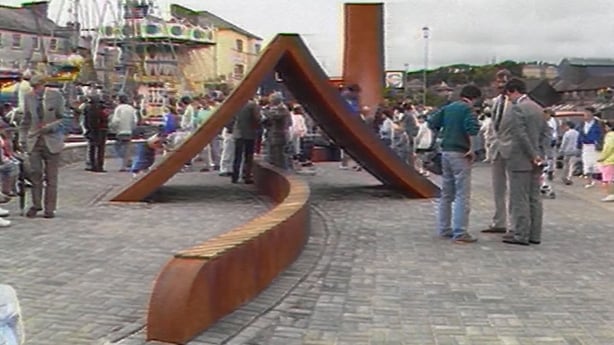 A copper-coloured work of art in the town of Kinsale consisting of long arches
