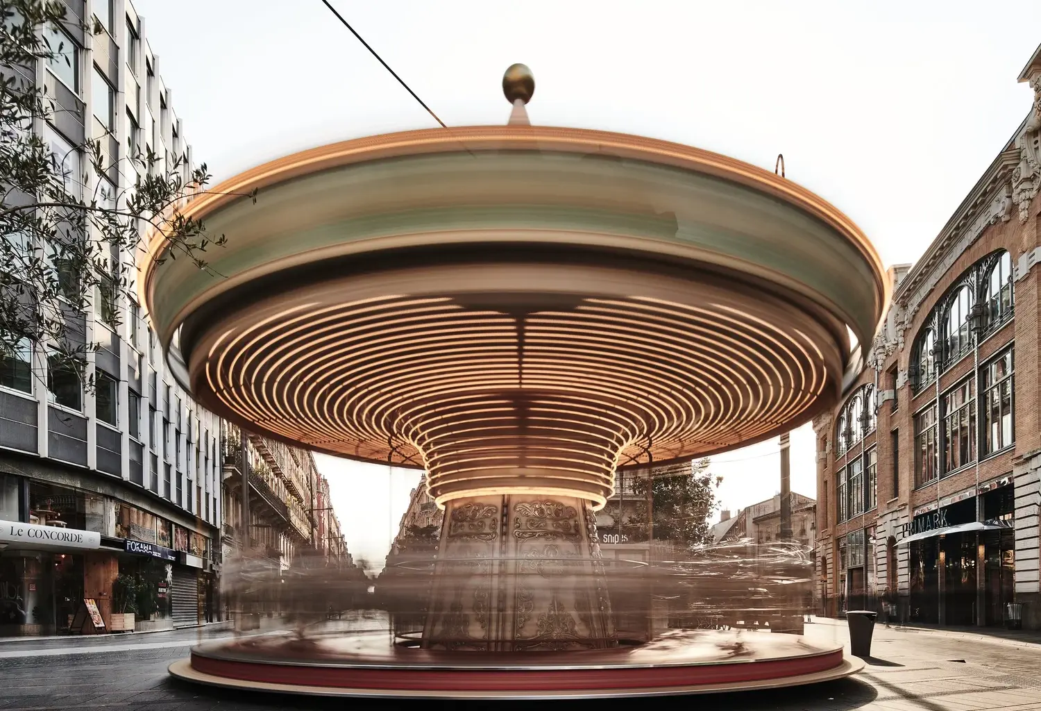a long-exposure photo of a spinning carousel