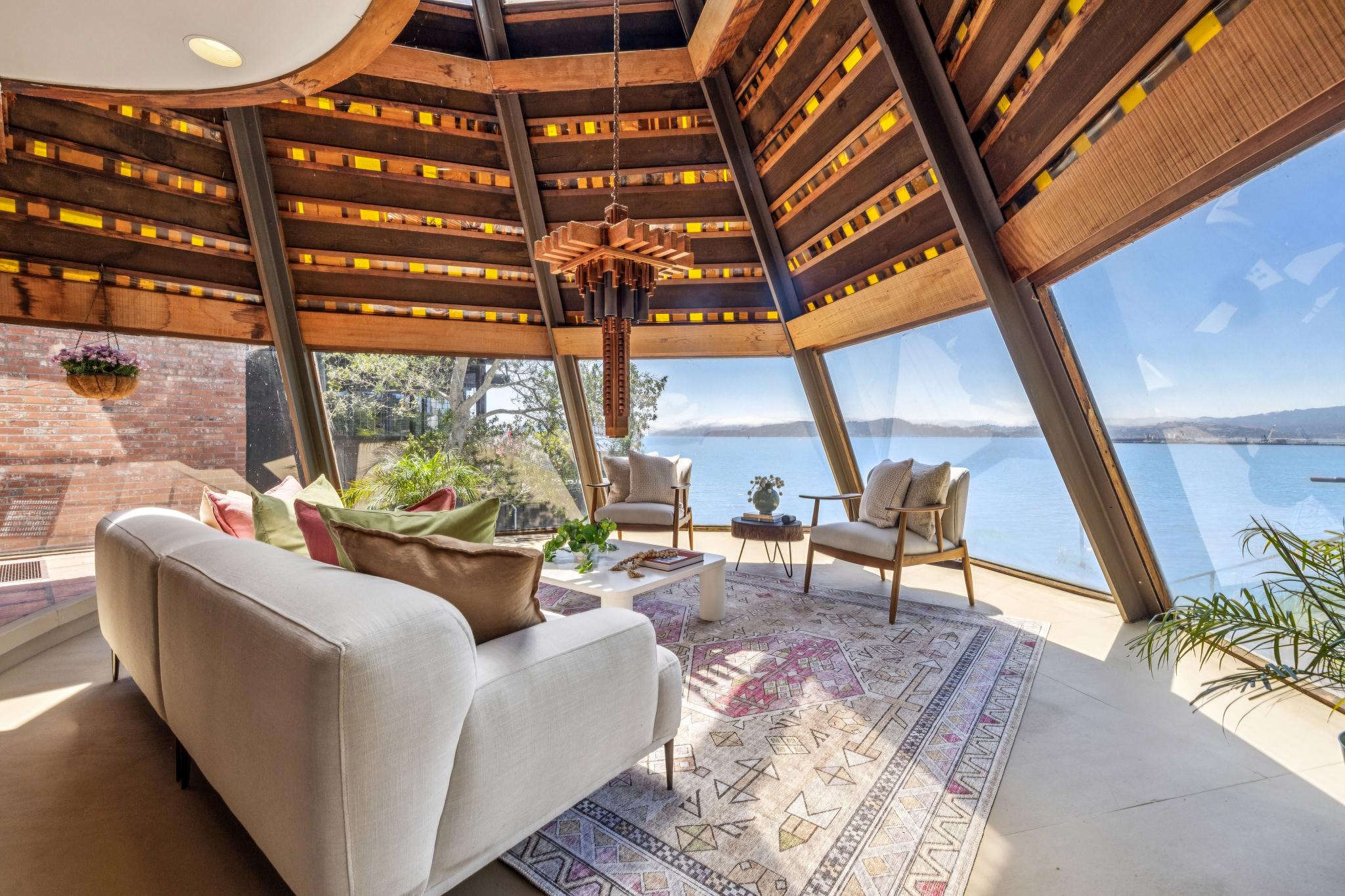 The house’s major selling point is the massive windows that wrap around it and open up the space with stunning views of the famed Golden Gate Bridge