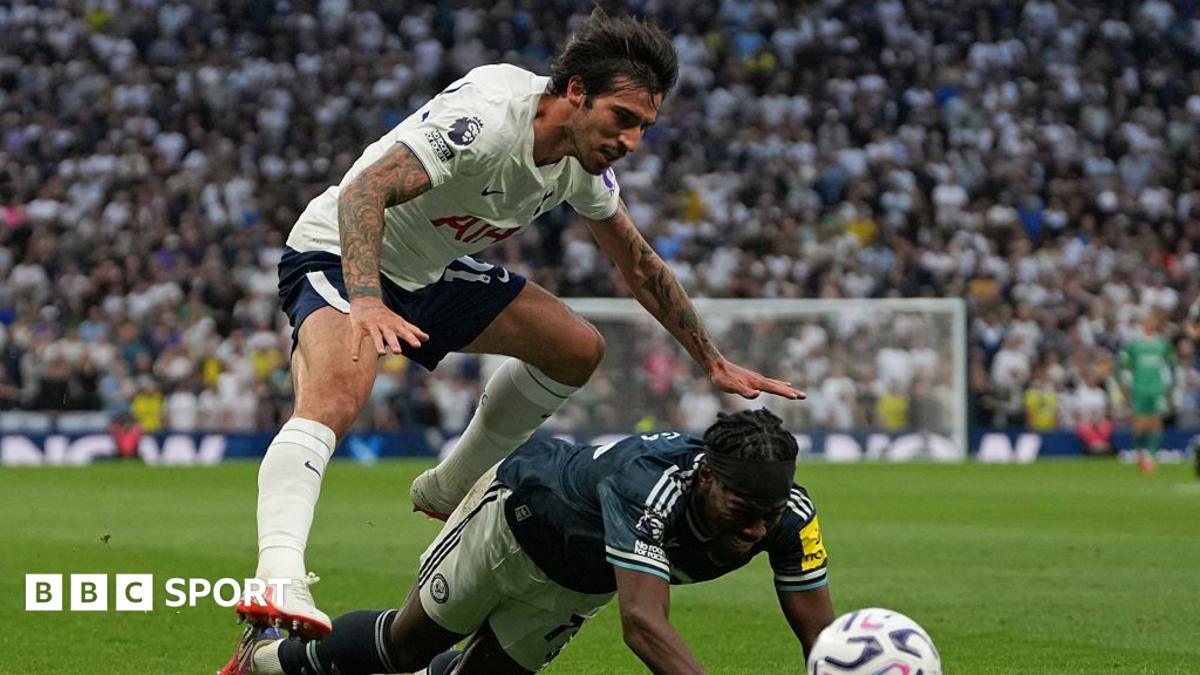 Tottenham's Sandro Tonali challenges Newcastle's Anthony Elanga during their Premier League match at the Tottenham Hotspur Stadium in north London.