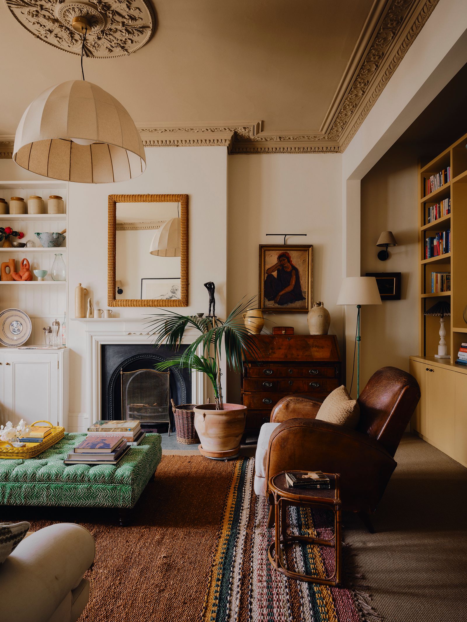 Image may contain Home Decor Furniture Rug Architecture Building Indoors Living Room and Room