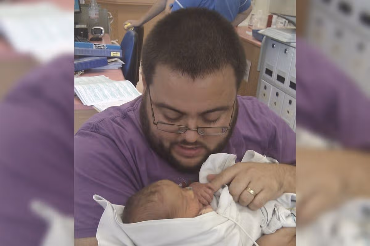Craig Bayliss with his son Isaac after he was born