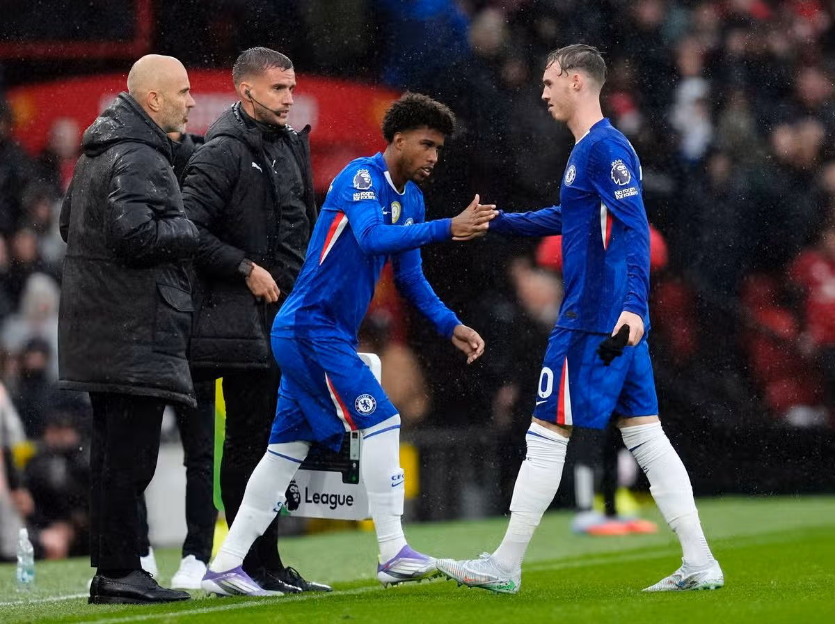 Chelsea's Cole Palmer is substituted for Andrey Santos during the Premier League match at Old Trafford.